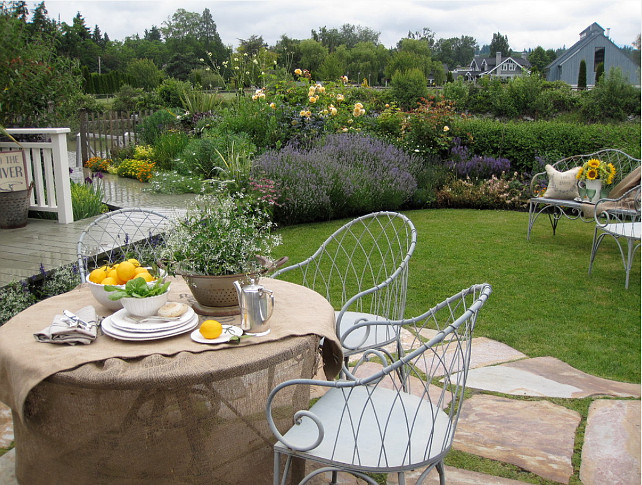 Cottage Garden. Cottage perennial, dahlia, flagstone, flagstone patio, garden ideas, iris, Phormium, planter, pots and planters, salvia. #garden #patio #plants Glenna Partridge Garden Design.