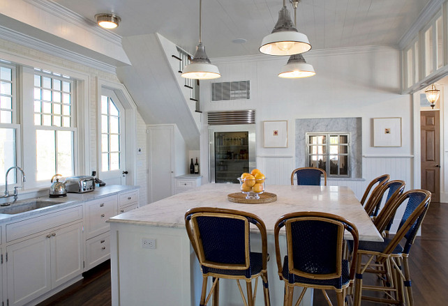 Cottage Kitchen. White Cottage Kitchen. Cottage kitchen with barn light pendants. Kitchen island with marble countertop. #Kitchen #Cottage #KitchenCottage John Hummel & Associates.