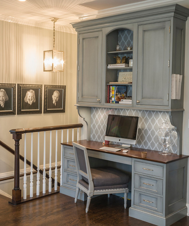 Desk. Built-in Desk. Gray Built-in Desk. Built-in Desk with Wallpaper. Beatiful desk for planning family activities. Wallpaper backsplash. Built-in Desk Design. Desk Layout. Custom Built-in Desk. Wallpaper is Farrow & Ball Crivelli Trellis. The gray cabinet paint color is a custom paint to match Farrow & Ball's Railings #31. #BuiltinDesk #Desk #DeskLayout