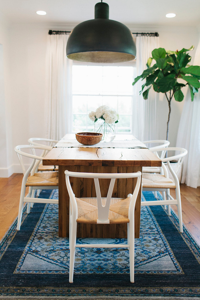 Dining Room Antique Rug. Dining Room Navy Antique Rug. Transitional Dining Room Navy Antique Rug and Wishbone dining chairs. #DiningRoom #Navy #AntiqueRug Shea McGee Design.