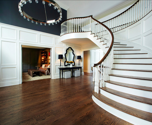 Entryway. Grand entrayway design View into library/study from grand entry foyer. The floors of this home were stained with a custom blend of walnut and dark oak stain to let the grain of the white oak shine through. #EntrywayIdeas #Entryway 