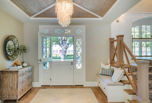 Foyer. Entry foyer with Dutch Doors. The interior of the Dutch doors are painted in Benjamin Moore White Dove, along with the millwork in this space. Foyer with Dutch Doors. Foyer Dutch Doors. Coastal Beach house foyer with Dutch Doors. #Foyer #DutchDoors Great Neighborhood Homes.