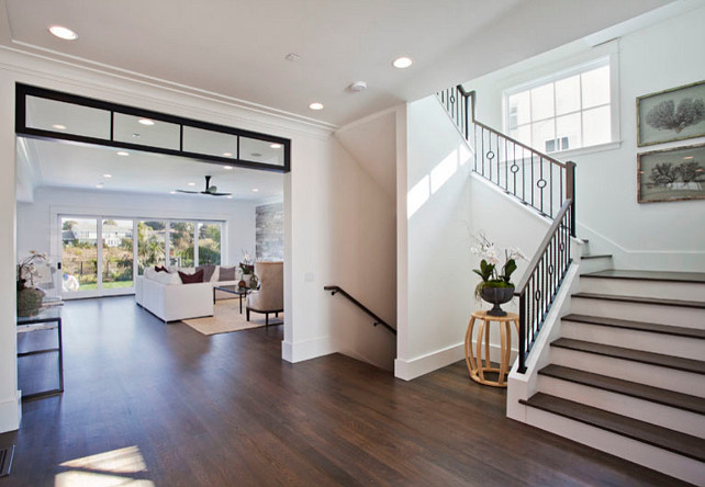 Foyer. Foyer with hardwood flooring, staicase, custom railings and transom. #Foyer #Transom #staicase #customRailings #HardwoodFlooring