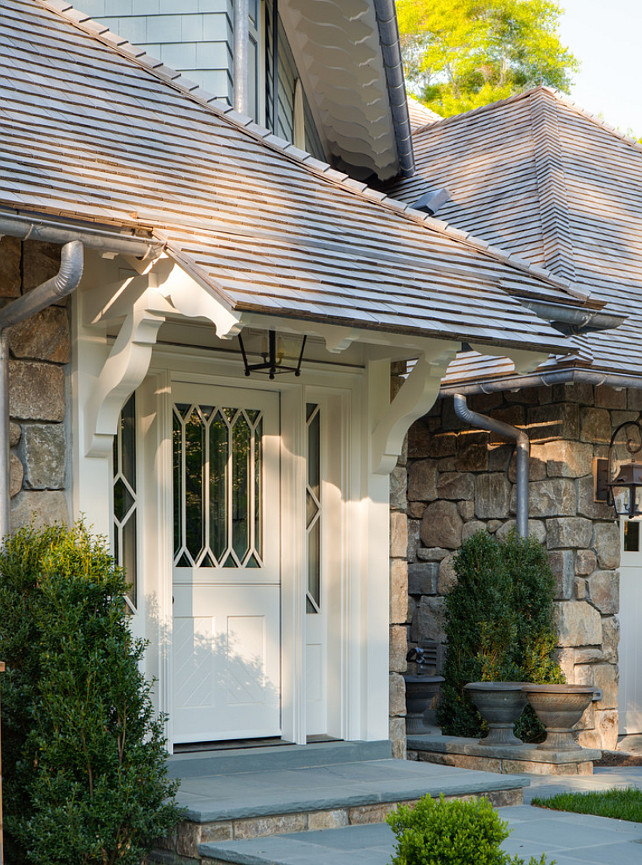 Front Door Ideas Traditional Front Door Door Paint Color: The trim and door is Benjamin Moore Navajo white 50% of formula Moore Glo (Benjamin Moore exterior paint). Significant Homes LLC