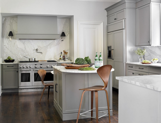 Gray Kitchen with white marble countertop and white marble slab as backsplash. Interior Design by Beth Webb Interiors.