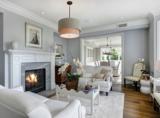 Gray Living Room. Gray Living Room with white sofas. Gray Living Room with white accents. Lighting is the Restoration Hardware Two-Tier Round Shade Pendant. #GrayLivingRoom #LivingRoo