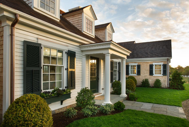 Home Exterior Paint Color Combination. Trim is Sherwin Williams Pure White. Sherwin Williams SW 7005 Pure White. Front Door is Benjamin Moore Essex Green. #HomeExteriorPaintColor