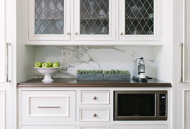 Kitchen Cabinet. Kitchen Coffee Station Flanked by paneled Refriderator and paneled freezer. #Kitchen #Cabinet #PaneledRefrigerator #PaneledFreezer Jean Stoffer Design.