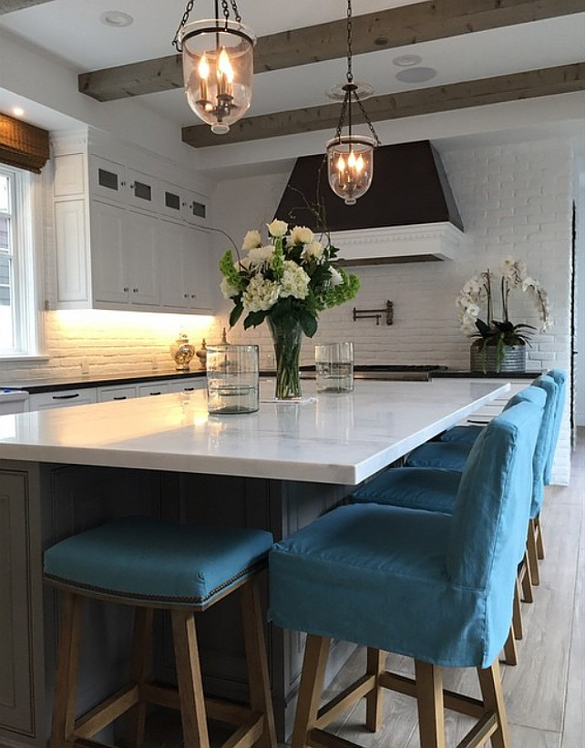 Kitchen Countertstools. Linen slip covered counter stools. Turquoise linen slip covered counter stools. #linenslipcoveredcounterstools Graystone Custom Builders