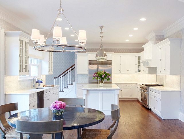 Kitchen Design Ideas. Polished nickel was used as the prominent metal for all light fixtures in the kitchen area. Walls were wallpapered with a soft pattern of lilac, white color and wallpaper. #KitchenDesignIdeas #KItchen