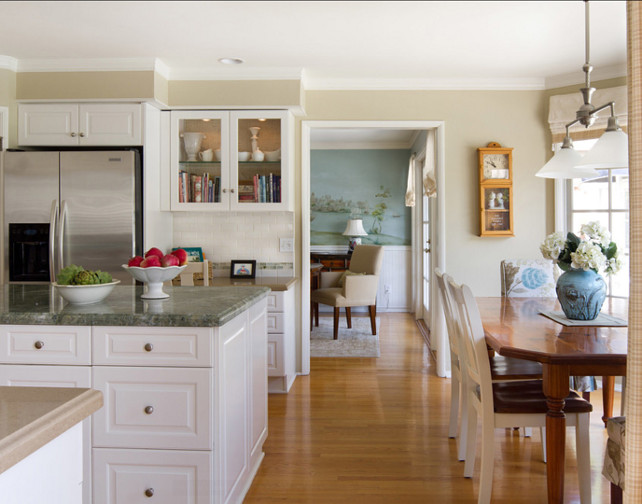 Kitchen Design Ideas. The blues and greens flow from the kitchen into the formal dining area where a custom mural was hand painted. #KitchenDesign