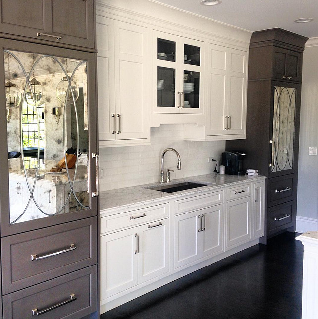 Kitchen Freezer and Fridge with mirrored cabinets. A. Perry Homes.