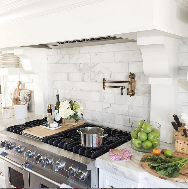 Kitchen Hood with marble tile backsplash. Pink Peonies.