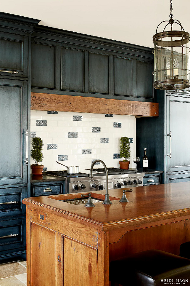 Custom Backsplash Tiles. Kitchen with custom backsplash tiles. Custom, hand-painted tile backsplash designed by Heidi Piron Design & Cabinetry. 