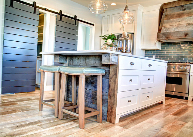 Kitchen Ideas. Kitchen with reclaimed wood and barn doors. #Kitchen #ReclaimedWood. #BarnDoor Dwellings Inc.