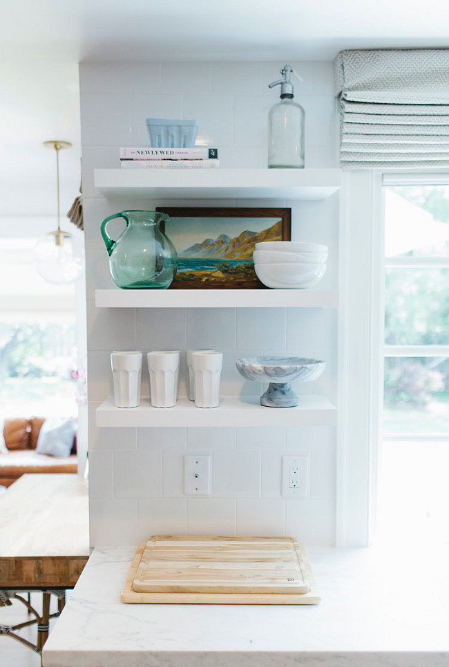 Kitchen Open Shelves against Backsplash. This kitchen features counter to ceiling backsplash and open floating shelves. #Openshelves #Backsplash #kitchen Studio McGee.