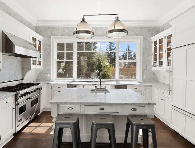 Kitchen Wall Tile Ideas. Wall Tiling Kitchen Ideas. White Kitchen with tiled walls to ceiling. Via Sotheby's Homes.