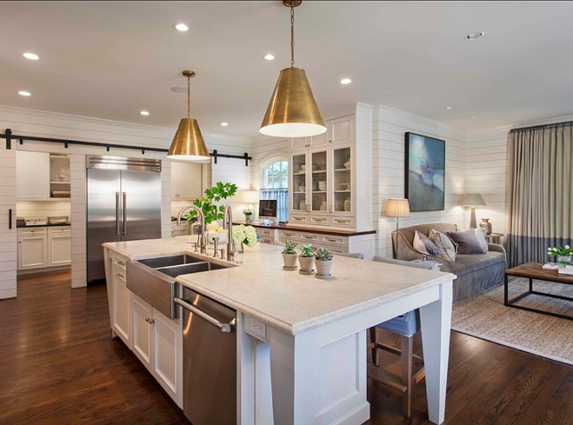 Kitchen island. Kitchen Island Countertop. Durable Kitchen countertop. Kitchen with white island and 3cm Taj Mahal Quartzite. #kitchenIsland #KitchenCountertop #DurableCountertop #TajMahalQuartzite