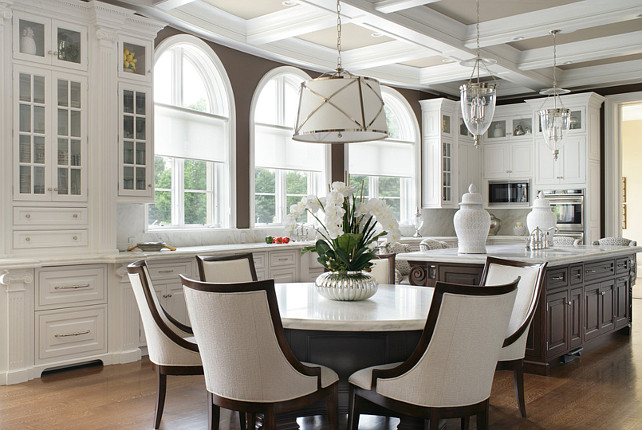 Kitchen lighting Ideas. Lighting pendants above kitchen island are the Hudson Valley Hanover 143-HN. Lighting above table is E.F. Chapman Grosvenor Large Single Pendant. #KitchenLighting #KitchenLightingIdeas.