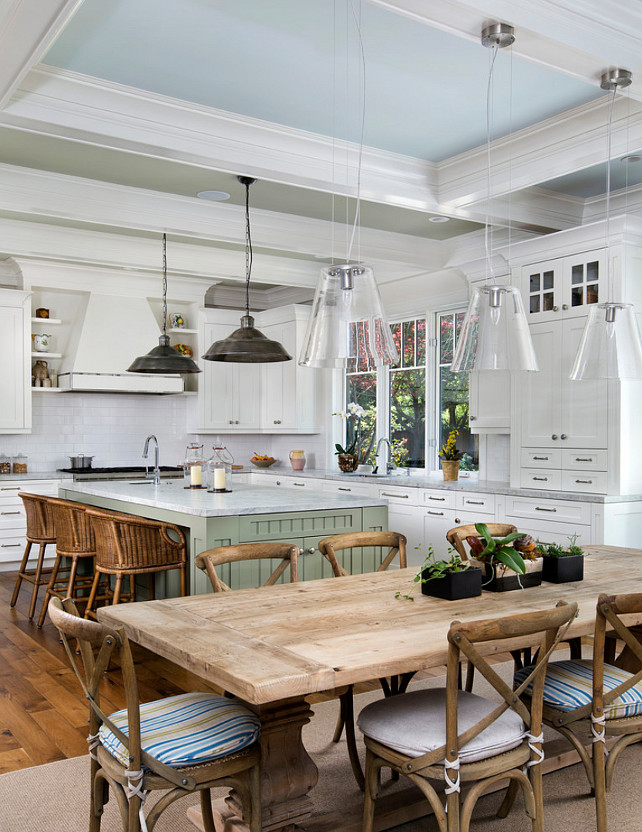 Kitchen. Transitional kitchen with painted island and blue ceiling. Kitchen with farmhouse table. #Kitchen #TransitionalKitchen Markay Johnson Construction
