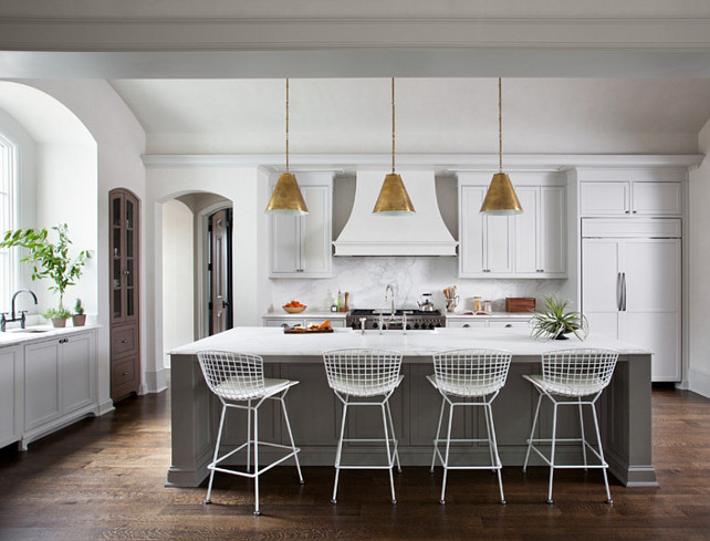 Kitchen. White and gray kitchen cabinet Ideas. White Kitchen with gray kitchen island. Lighting above island are the Thomas O'Brien's Goodman Hanging Lamp #Kitchen Ryan Street & Associates