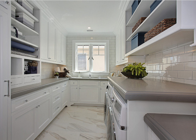 Laundry Room. White laundry Room cabinet. White laundry Room cabinet with gray quartz countertop and white subway tile backsplash. #laundryRoom