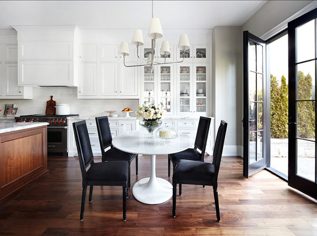 Breakfast Nook Design. This breakfast nook is modern and inviting. I am loving the table and lighting. #BreakfastNook #BreakfastArea #EatingNook