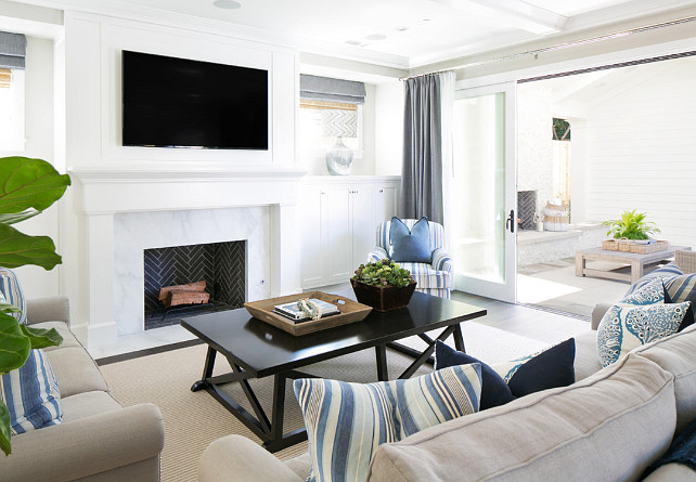 Living room furniture and decor. Neutral beach house living room with neutral furniture and gray, blue and white color palette. Brooke Wagner Design.