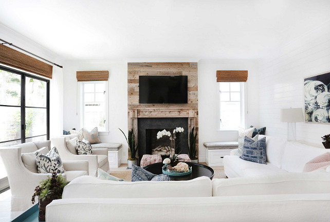 Living room with white sectional. Blackband Design.