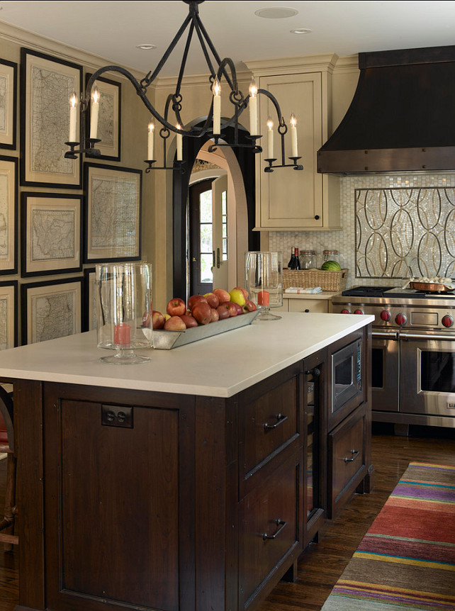 Kitchen Design Ideas. This kitchen has a very original design. Great idea of displaying vintage maps as art. #KitchenDesign 