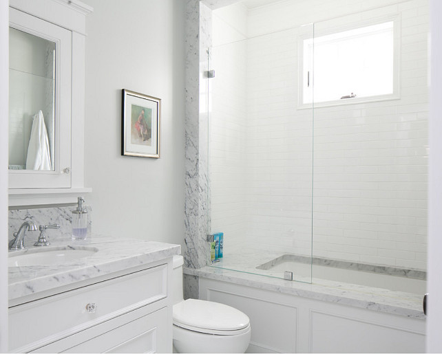 Marble and Subway Tile Shower. Bathroom shower framed with white marble and subway tile. #Bathroom #Shower #FramedShower #MarbleShower #SubwayTileShower Brandon Architects, Inc.