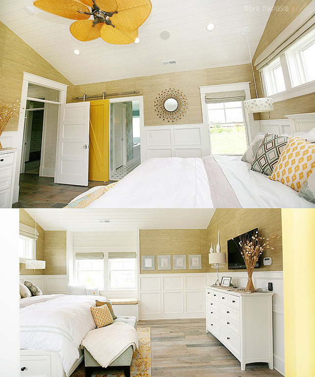 Master Bedroom Ideas. Master bedroom bedroom design with sand grasscloth wallpaper, wall panels, sunburst mirror, mustard yellow sliding barn door, beadboard ceiling, white wood bed, gray tufted bench, mirrored nightstands and built-in window seat. #MasterBedroom #Bedroom