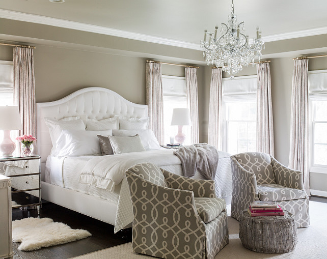 Master Bedroom. Gray Master Bedroom. Gray Paint Master Bedroom. Pink and gray bedroom features gray walls lined with a white tufted camelback bed. #MasterBedroom