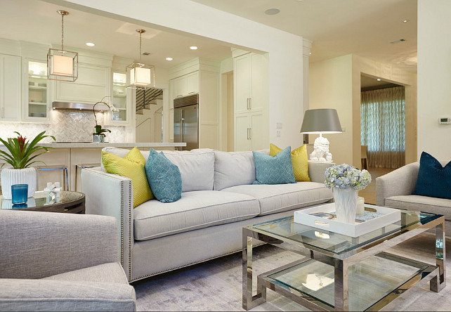 Modern living room opens to kitchen. Modern living room decor ideas. Butter Lutz Interiors, LLC.