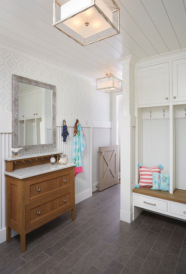 Mudroom. Durable mudroom ideas. Mudroom with corrugated steel in a white powder-coated finish as wainscoting. #Mudroom #Durable #Ideas Blend Interior Design.