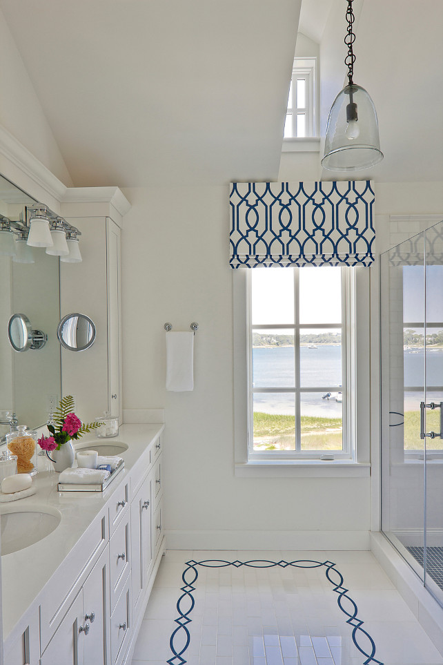 Ocean View Bathroom. Classic blue and white bathroom with ocean view. I love the affordable white subway tiles mixed with the navy blue custom tiles. #Bathroom #OceanView SLC Interiors.