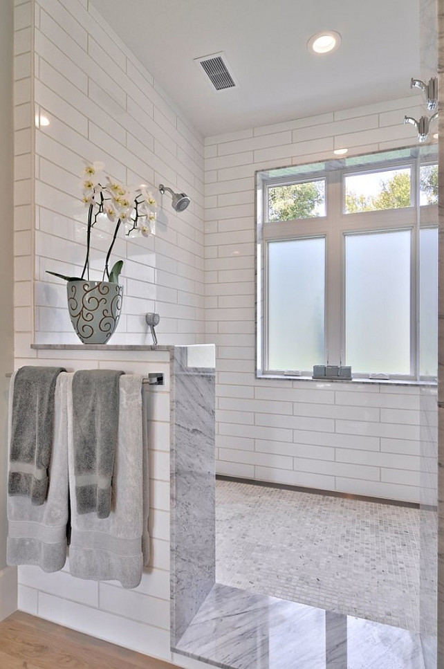 Open Shower. Open Shower with half wall. Open shower without doors and marble tiling. #OpenShoer #Bathroom #Marble #Tiling Redbud Custom Homes.