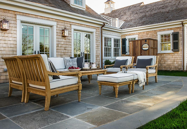 Patio Stones. Large stone tiles give the back patio a classic look that easily hides dirt and makes cleaning a breeze.