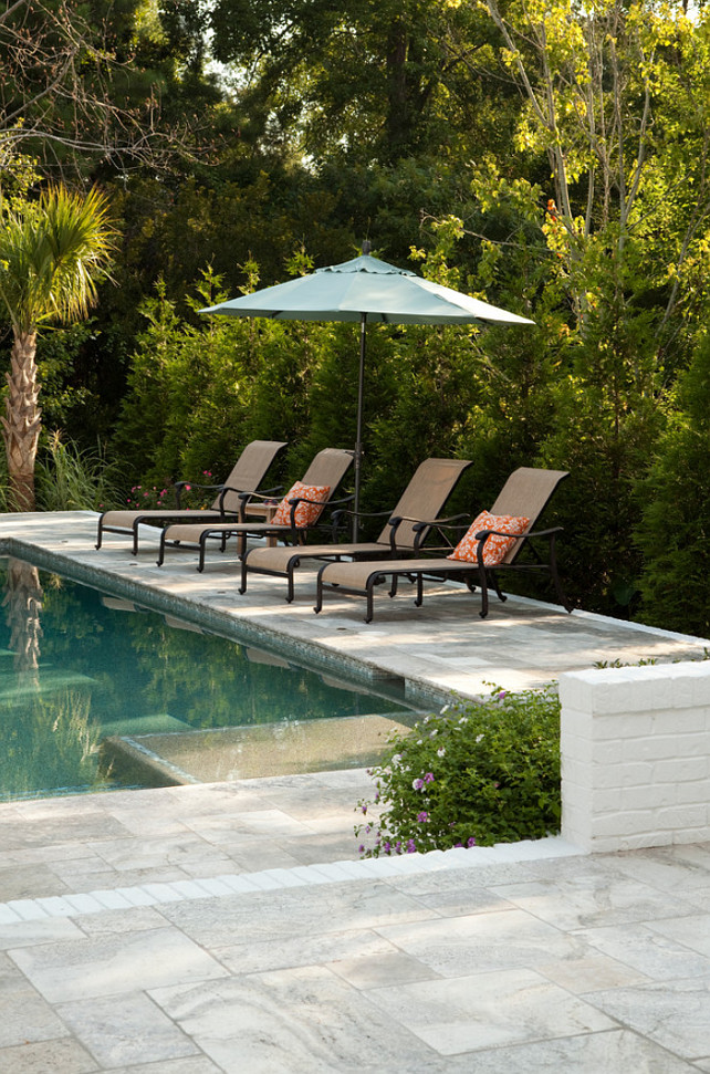 Pool Tiles. The patio flooring is gray travertine pavers. #Pool #Tiles #Pavers #Travertine Tongue & Groove Custom Builders.