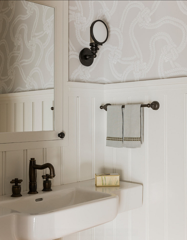 Powder Room Design Ideas. The sink in this powder room is by Laufen. Wallpaper is the "Rope" (White & Beige) by Cole & Son for Lee Jofa. #PowderRoom #Wallpaper #Sink #PowderroomDesign