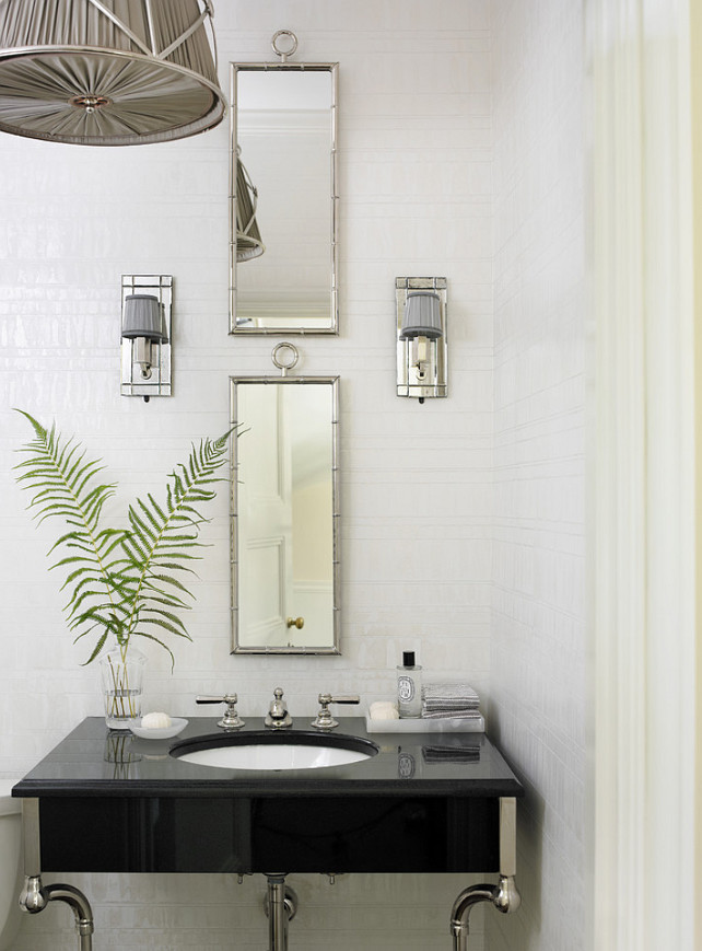 Powder room with floor-to-ceiling backsplash. Interior Design by Beth Webb Interiors.