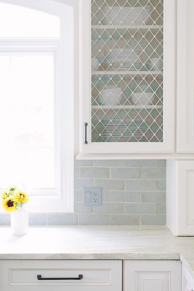 Quartzite Countertop. White Quartzite Countertop. Kitchen with White Quartzite Countertop and Blue Backsplash. #Quartzite #Countertop #WhiteQuartzite #Kitchen #BlueBacksplash Kate Marker Interiors.