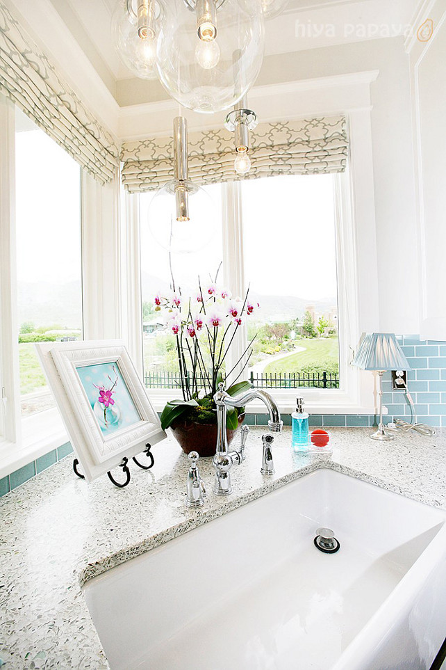 Recycled glass countertop. Kitchen with recycled glass countertop. The recycled glass countertop is by Vetrazzo and color is Glass House. #RecycledGlassCountertop