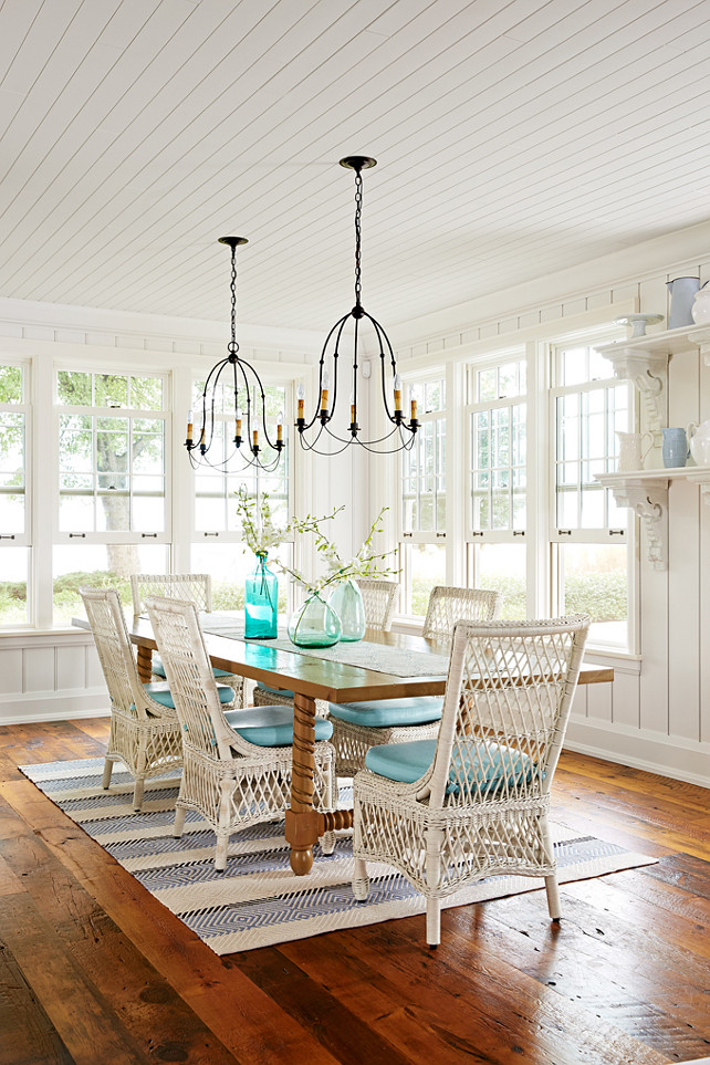 Sarah Richardson Interior Design. Sarah Richardson Interiors. Sarah Richardson Dining Room. What I always loved about Sarah Richardson's designs is the fact that she never complicate things. A clean yet warm design is always your best bet! Take for example this dining room where the entire room embraces serenity and the lake views. Also, notice the stunning reclaimed plank floors. #SarahRichardson Designed by Sarah Richardson.