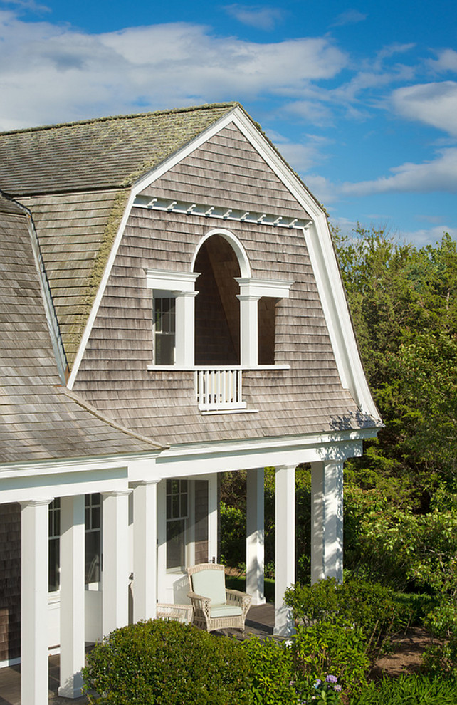 Shingle Gambrel Home. Balcony. Beach house. Shingle Cape cod. Cedar shake. Cedar siding. Colums. Gambrel roof. Martha's vineyard. Massachusettes. New England. Ocean. Porch. Shake roof. Shakes. Shingle. Summer house. Vacation house. Waterfront. Wood exterior. Wrap around porch.