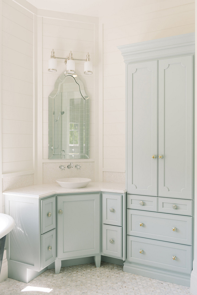 Shiplap paint color is White Dove OC-17 Benjamin Moore. Blue cabinet paint color is Woodlawn Blue HC-147.