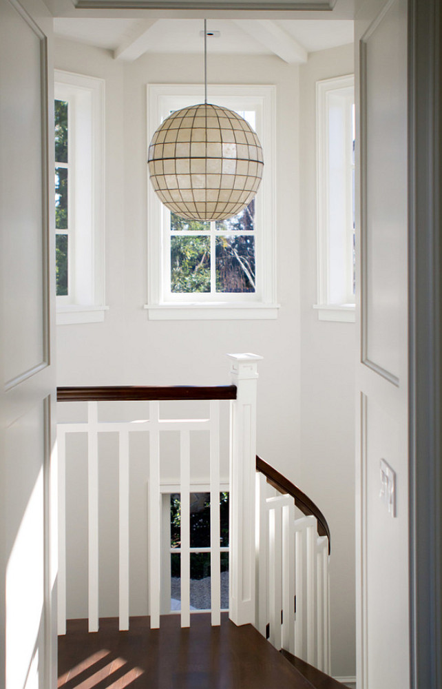 Staircase Lighting Ideas. Stairwell Lighting. Lighting is from Remain Lighting. #Lighting #StaircaseLighting Jackson Paige Interiors, Inc.