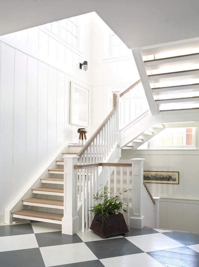 Staiwell Ideas. Bright Stairwell. The stairwell is painted Designer White by Pratt & Lambert. The sconce is from Circa Lighting. #Stairwell #StairwellDesign Burnham Design.