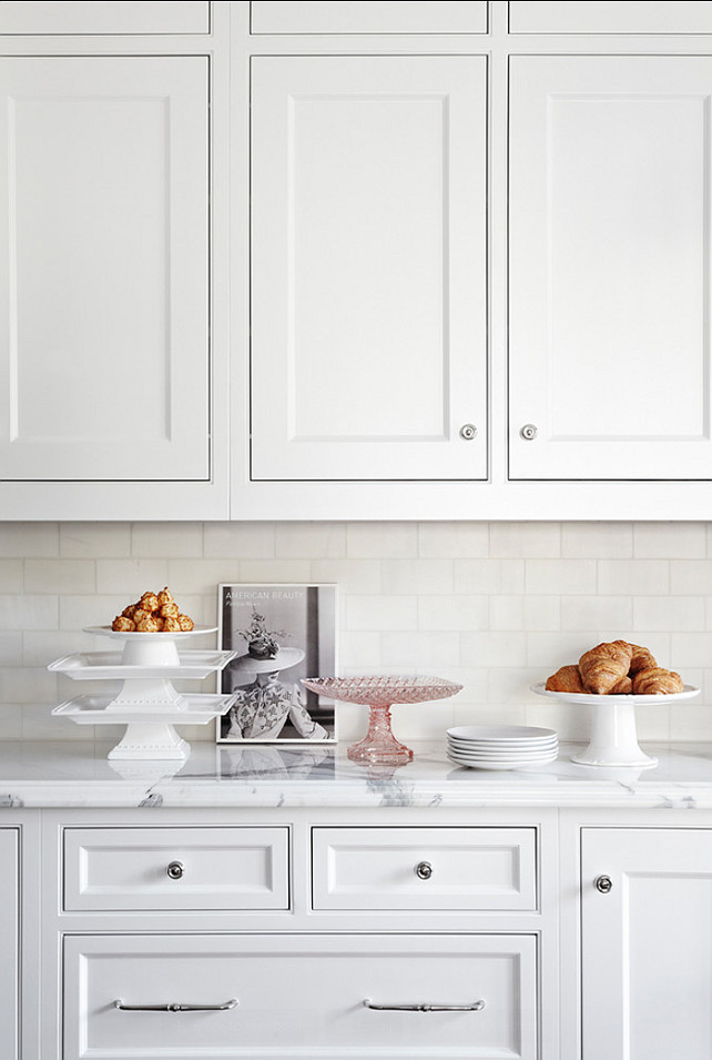 Backsplash Ideas. The backsplash in this kitchen is classic white subway tiles and white marble for the countertop. #Backsplash #Kitchen #ClassicSubwayTile #WhiteMarble #Kitchen