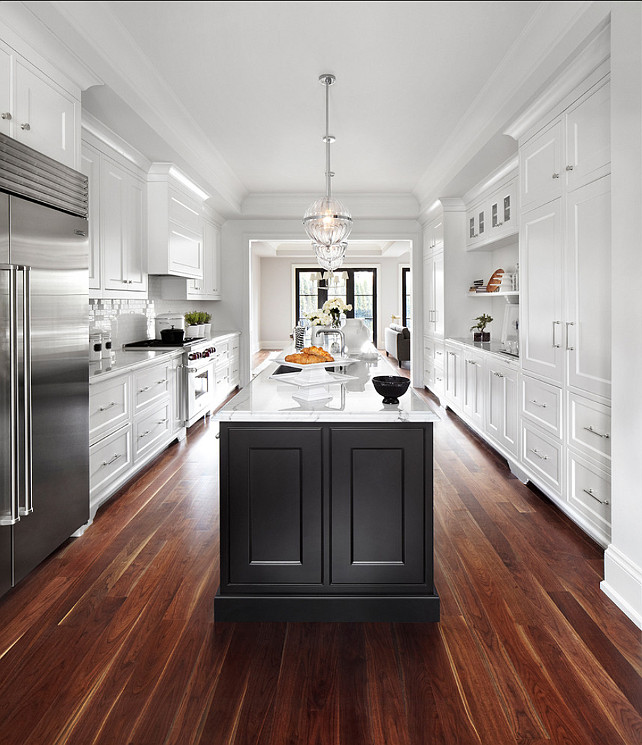 Kitchen Island Pendant Lighting. The pendant lighting in this kitchen is the "Cyan Design 04206 Janus small pendant". Flooring is Black Walnut. #Kitchen #KItchenLighting #PendantLighting #IslandPendants